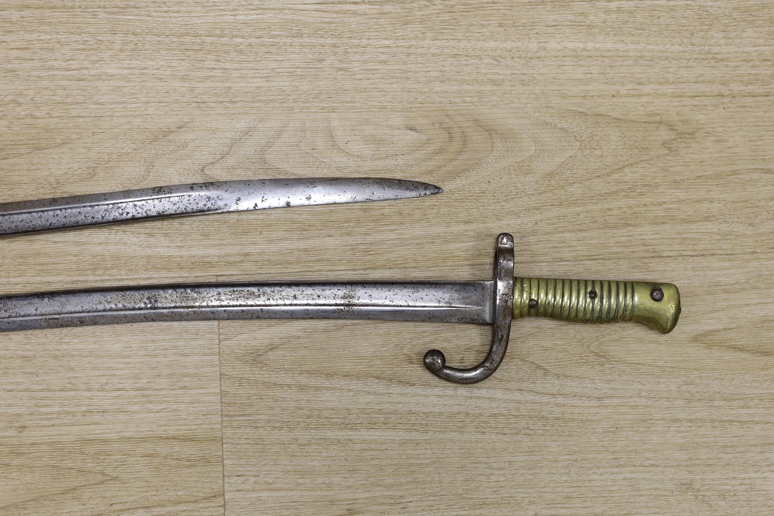 Two 19th century European bayonets, 69cm tall